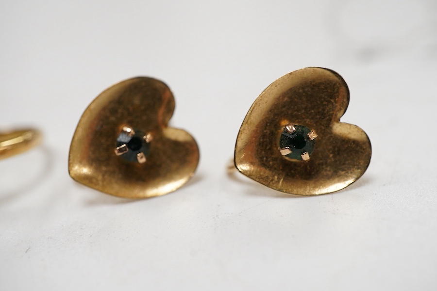 A pair of 14k yellow metal and gem set heart shaped ear clips, 12mm, a yellow metal heart shaped ring engraved 'Joyce' and a damaged Edwardian 18ct gold and gem set ring.